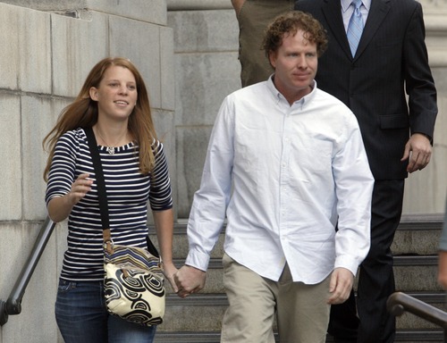 Tribune file photo
"That is legitimately my dad's property, no matter if it came from me," said Jeremy Johnson, seen leaving the federal courthouse in Salt Lake City with wife Sharla in September. . "The taxes were filed. It's his."