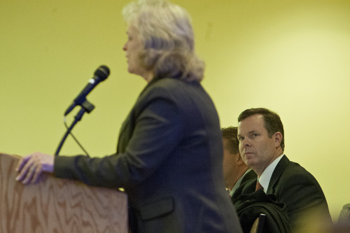 Chris Detrick  |  The Salt Lake Tribune
Utah Attorney General John Swallow listens as Gayle Ruzicka speaks during the Utah Eagle Forum annual convention at the Salt Lake Radisson Hotel Saturday January 12, 2013.