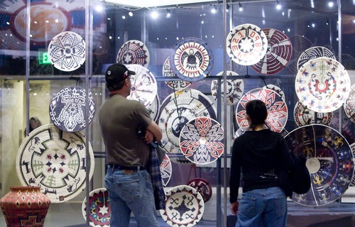 Kim Raff  |  The Salt Lake Tribune
Bill and Cindy Thomas look at a display in "A Celebration of Contemporary Navajo Baskets" exhibit, which opened at the Natural History Museum of Utah in Salt Lake City on January 12, 2013. The exhibit features more than 150 works of art created by the basket weavers of Monument Valley, Utah.