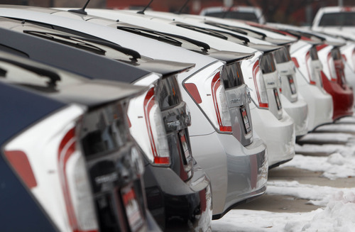Trent Nelson  |  The Salt Lake Tribune
A row of new Prius's for sale at Mark Miller Toyota Tuesday January 8, 2013 in Salt Lake City.