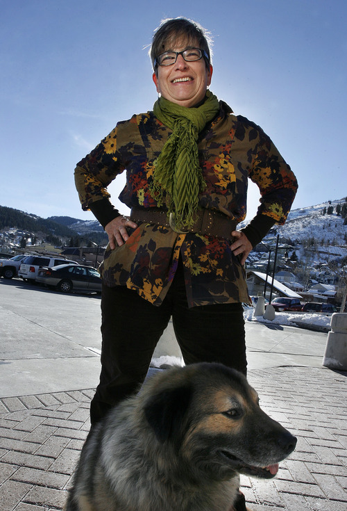 Scott Sommerdorf   |  The Salt Lake Tribune
Rhoda Stauffer, with her dog, Bailey,  outside City Hall in Park City, is a film buff and a volunteer for the Sundance Film Festival.