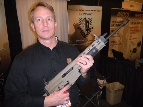 Tom Wharton | The Salt Lake Tribune
Alex Robinson of Robinson Armament Company in North Salt Lake displays a rifle he sells at his booth at the SHOT Show in Las Vegas.
