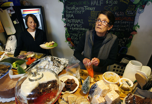 Scott Sommerdorf   |  The Salt Lake Tribune
Uptown Fare owner Karleen Reilly, right, and her daughter Nivin Lloyd prepare orders on Jan. 9, 2013. During the Sundance Film Festival, Reilly only serves locals at her small restaurant at the top of Main Street.
