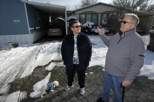 Francisco Kjolseth  |  The Salt Lake Tribune
Steve Anderson, a retired mobile home owner and activist for legislation supporting the rights of mobile home owners, pictured alongside his wife Nancy is suing the owner of the Murray park, Cottonwood Coves, where he rents his lot space. He says the owner unilaterally changed the terms of the rental contract without getting signatures from both parties. The owner reduced the grace period from 10 days to five and is now charging for water, sewer and garbage on top of the lot rental fee -- those costs used to be included in the rent, so in essence it equates to a rent increase. Steve and Nancy and their dog Gus have lived in the park for 8-years and have been battling this issue since last Summer.