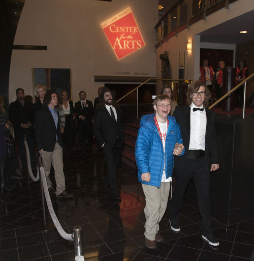 Steve Griffin | The Salt Lake Tribune


Kevin Pearce, right, and his brother David Pearce enter the Rose Wagner Performing Arts Center and the red-carpet premiere of "The Crash Reel," a documentary about former Utah snowboarder Kevin Pearce, who suffered brain injury in a crash.  Friday January 18, 2013 in Salt Lake City, Utah. Steve Griffin  |  The Salt Lake Tribune