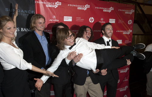 Steve Griffin | The Salt Lake Tribune


Kevin Pearce is held up by his friends at the red-carpet premiere of "The Crash Reel," at the Rose Wagner Performing Arts Center Friday January 18, 2013 in Salt Lake City, Utah. The movie is a documentary about former Utah snowboarder Kevin Pearce, who suffered brain injury in a crash.  The film's director director Lucy Walker  is at left.  Steve Griffin  |  The Salt Lake Tribune