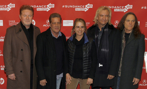 Rick Egan  | The Salt Lake Tribune 

The Eagles L-R Don Henley, Glenn Frey, film maker Alison Ellwood, Joe Walsh and Timothy B. Schmit pose for photos before the premiere of "History of the Eagles, Part 1" at the Eccles Theater, Saturday, January 19, 2013.