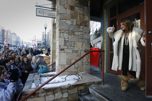 Rick Egan  | The Salt Lake Tribune 

Jane Seymour peeks out of the LA Times on Main Street door to say hello to her fans on lower Main Street,  Saturday, January 19, 2013.