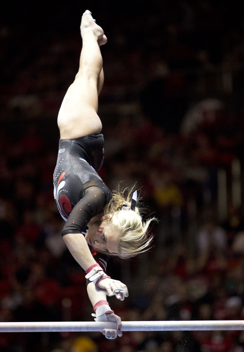 Lennie Mahler  |  The Salt Lake Tribune
Hailee Hansen performs on the uneven bars earning a 9.775 in a meet against Oregon State, West Virginia, and SUU at the Huntsman Center, Saturday, Jan. 19, 2013. The Red Rocks edged the competition with a final score of 196.950, followed by Oregon State with a score of 195.950.