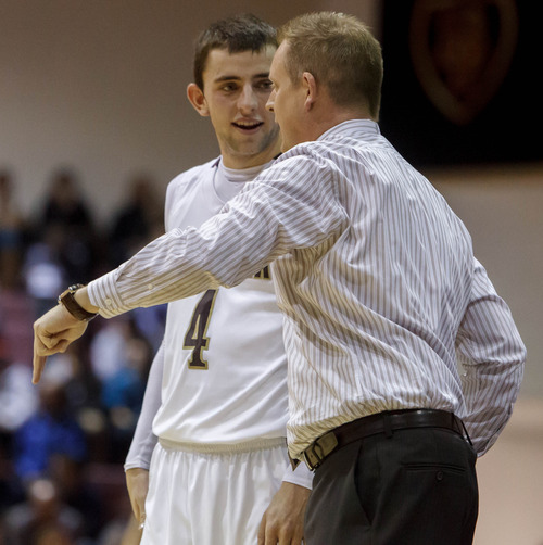 Trent Nelson  |  The Salt Lake Tribune
Lone Peak's Nick Emery and coach Quincy Lewis converse as Lone Peak hosts Riverton High School basketball Wednesday January 9, 2013 in Highland.