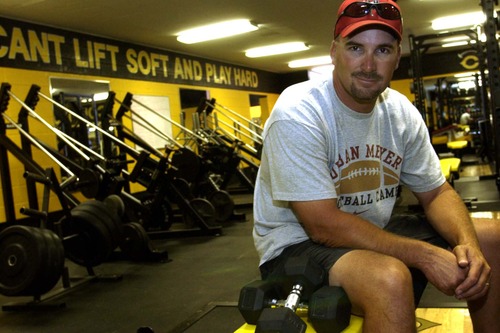 Tribune file photo
In this 2004 photo, former U. of U. quarterback Scott Cate sits in the Cottonwood High weight room after he paid for a major renovation. Cate, who donated millions of dollars to the school, said he will give no more money now that the Granite School District is more involved in the process. "Every time the district stuck their nose into one of my projects … the cost went up three times," Cate said.