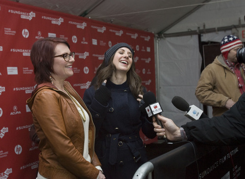 Kim Raff  |  The Salt Lake Tribune
Actresses (left) Megan Mullally and Alison Brie give an interview on the red carpet for the premiere of "Toy's House" at the Park City Library Center during the Sundance Film Festival in Park City on January 19, 2013.