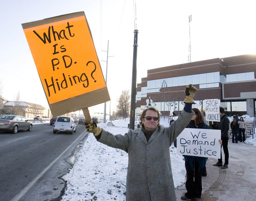 Paul Fraughton  |  The Salt Lake Tribune
A group of people in support of Danielle Willard, who was shot and killed by West Valley police officers, hold posters in front of West Valley City Hall critical of the police department and its handling of the shooting.
 Tuesday, January 22, 2013
