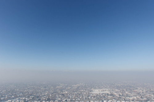 Trent Nelson  |  The Salt Lake Tribune
Smog trapped in an inversion layer over Salt Lake City, Tuesday, January 22, 2013.