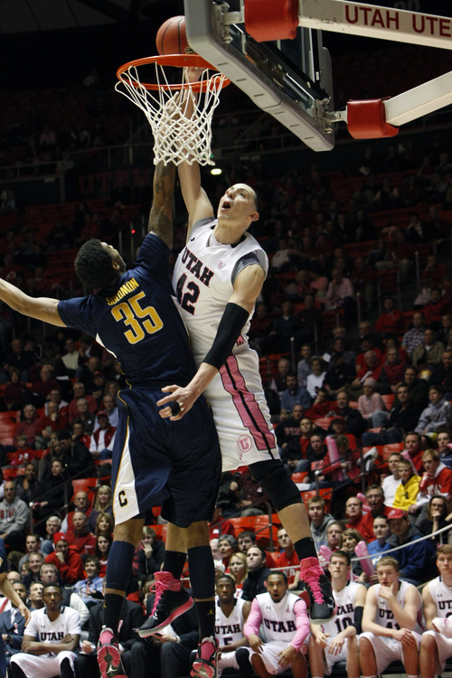 Chris Detrick  |  The Salt Lake Tribune
Utah Utes center Jason Washburn (42) misses a dunk while being guarded by California Golden Bears forward Richard Solomon (35) during the second half of the game at the Huntsman Center Thursday January 24, 2013. Cal won the game 62-57.
