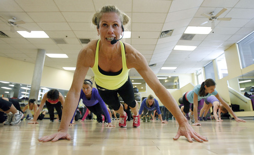 Francisco Kjolseth  |  The Salt Lake Tribune
Jenny Larsen, a dancer who will be performing with the SB Dance Company for shows Jan. 25-26, leads an intense kickboxing work out session recently at BodyWise at Foothill Village.