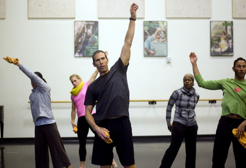Kim Raff  |  The Salt Lake Tribune
(middle) Stephen Brown choreographs dancers during rehearsal for an upcoming show at the Rose Wagner Performing Arts Center in Salt Lake City on December 16, 2012.