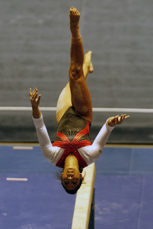 Chris Detrick  |  The Salt Lake Tribune
Kassandra Lopez competes on the during the annual Red Rocks gymnastics preview at the Huntsman Center Friday December 7, 2012.