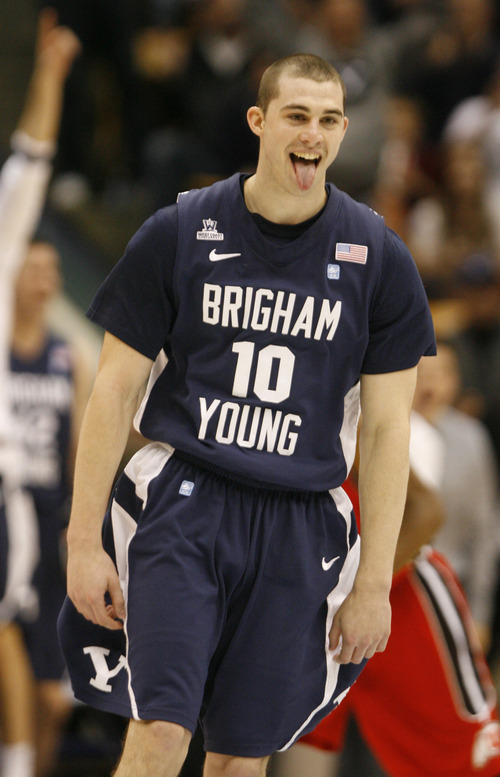Rick Egan  | The Salt Lake Tribune 

Brigham Young Cougars guard Matt Carlino (10) celebrates after tying the game 52-52 with at hree-pointer, in basketball action between the Brigham Young Cougars and the Utah Utes at the Marriott Center in Provo, Saturday, December 8, 2012.