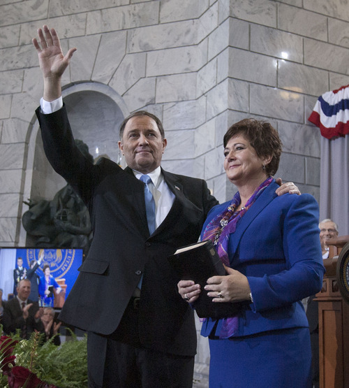 Steve Griffin  |  Tribune file photo
Utah Gov. Gary Herbert and first lady Jeanette Herbert wave to the crowd after Gary Herbert was sworn into office as Utah's 17th governor by Chief Justice Matthew B. Durrant at the Utah State Capitol in Salt Lake City, Utah Monday January 7, 2013.