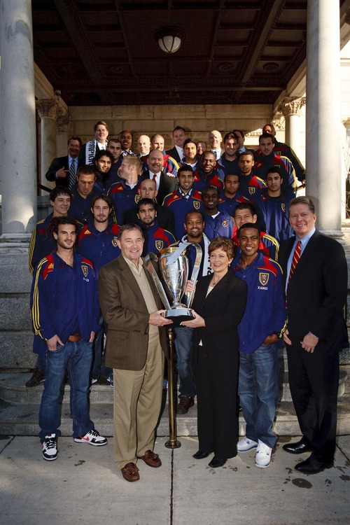 Trent Nelson  |  The Salt Lake Tribune
Gov. Gary Herbert and his wife Jeanette hold the MLS Cup Trophy with Real Salt Lake players, coaches and executives after a luncheon at the Governor's Mansion in 2009. At left is team owner Dave Checketts.