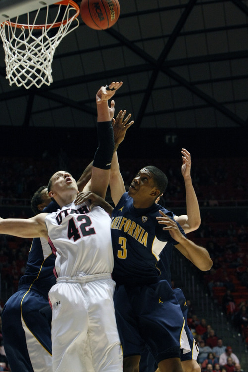 Chris Detrick  |  The Salt Lake Tribune
Utah Utes center Jason Washburn (42) and California Golden Bears guard Tyrone Wallace (3) go up for a rebound during the first half of the game at the Huntsman Center Thursday January 24, 2013. Cal is winning the game 32-22.