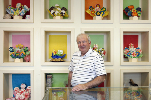 Rick Egan  | The Salt Lake Tribune 
Ron Cluff in his Cookies By Design store on Highland Drive, across the street from the old Cottonwood Mall. Cluff moved his shop from Cottonwood Mall before it was demolished. "We were told when they tore it down that they would rebuild in two years. That was almost seven years ago," Cluff says. "All I hear now is that they'll build it up, but I don't think it will be in my lifetime."