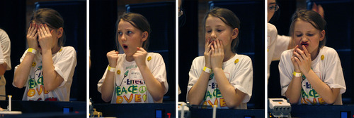 Scott Sommerdorf   |  The Salt Lake Tribune
Angela Jentzsch, 8, runs through a range of emotions as her team, J-Effect, runs its LEGO robot through a series of tasks at the 3rd annual Utah First Lego League Championships at the University of Utah, Saturday, January 26, 2013.
