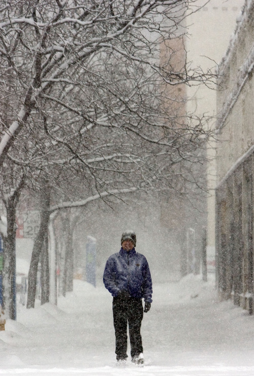 Kim Raff  |  The Salt Lake Tribune
Larry Dustin walks down 300 South as heavy snow falls in downtown Salt Lake City on January 27, 2013.