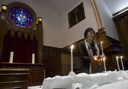 Kim Raff  |  The Salt Lake Tribune
Cynthia ofthedesert lights a candle and speaks a few words in remembrance of those touched by nuclear testing during the Utah Campaign to Abolish Nuclear Weapons second annual day of remembrance for downwinders at Skaggs Memorial Chapel at First Baptist Church in Salt Lake City on January 27, 2013.