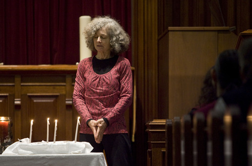 Kim Raff  |  The Salt Lake Tribune
Beth Blattenberger lights a candle and speaks a few words in remembrance of those touched by nuclear testing during the Utah Campaign to Abolish Nuclear Weapons second annual day of remembrance for downwinders at Skaggs Memorial Chapel at First Baptist Church in Salt Lake City on January 27, 2013.
