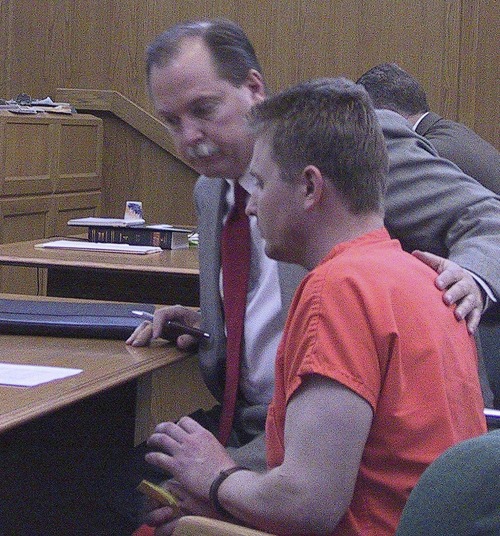 Thomas Burr  |  Pool, The Salt Lake Tribune
Murder suspect Patrick L. Daniel appears in 6th District Court in Richfield with his attorney, John Hummel. Hummel now finds himself as the defendant. He will stand trial Monday in a Panguitch courtroom on seven felony counts of theft or attempted theft by extortion.