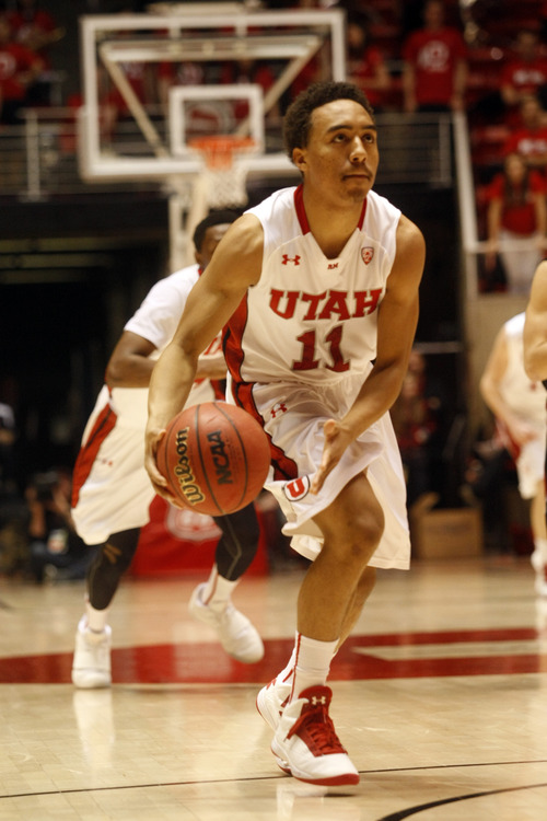 Ashley Detrick  |  The Salt Lake Tribune
Utah Utes guard Brandon Taylor (11) recovers a free ball and drives the basket during the game against Stanford at Utah Sunday January 27, 2013. Utes were trailing the Cardinals at half, 46-26.
