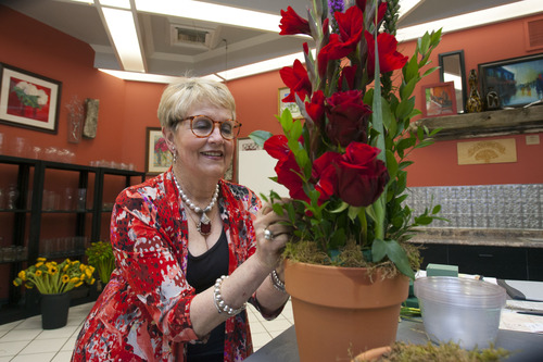 Steve Griffin | The Salt Lake Tribune

Pam March, owner of Every Blooming Thing, works on an arrangement at her store in Salt Lake City, Utah Tuesday January 29, 2013.