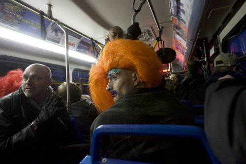 Kim Raff  |  The Salt Lake Tribune
Ivonna Coxx, a drag queen with the Utah Cyber Sluts, rides a shuttle to Main Street during the Sundance Film Festival in Park City on January 19, 2013.