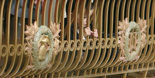 Steve Griffin | The Salt Lake Tribune

Gray Miles, 2, peeks through the rails of the upstairs gallery of the Senate chambers during the opening of the 2013 legislative session at the Utah State Capitol in Salt Lake City Monday January 28, 2013. Gray was there with his mother, Allison Miles, to see his grandfather, Sen. Brain Shiozawa, honored during the opening session.