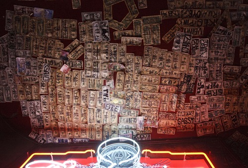 Leah Hogsten  |  The Salt Lake Tribune
The Shooting Star Saloon ceiling is lined with signed dollar bills from customers celebrating their aquaitance with Utah's oldest alcohol-serving establishment.