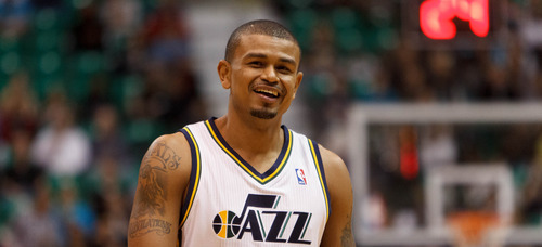 Trent Nelson  |  The Salt Lake Tribune
Utah Jazz point guard Earl Watson (11) laughs after being fouled during a game against Toronto on Dec. 7, 2012.