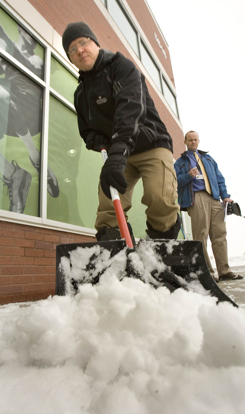 Paul Fraughton  |  The Salt Lake Tribune
Roger Davies, a physical trainer at TOSH (The Orthopedic Specialty Hospital), demonstrates the proper way to use a snow shovel. The hospital announced Wednesday its " Snow Shovel Brigade" program where the hospital is giving away 100 free snow shovels to people who pledge to use the shovels to help others who are physically unable or at risk for injury to shovel their walks and driveways.
 Wednesday, January 30, 2013