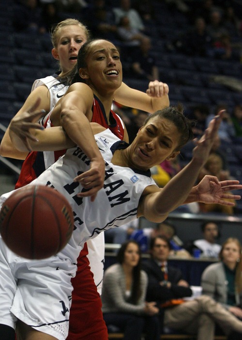Kim Raff  |  The Salt Lake Tribune
BYU player (front) Xojian Harry competes with St. Mary's player Jackie Nared for a rebound during a game at the Marriott Center in Provo on January 31, 2013.