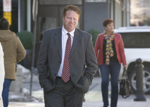 Paul Fraughton  |  The Salt Lake Tribune
A seemingly upbeat Jeremy Johnson prepares to enter the federal court building in Salt Lake City.
 Friday, February 1, 2013