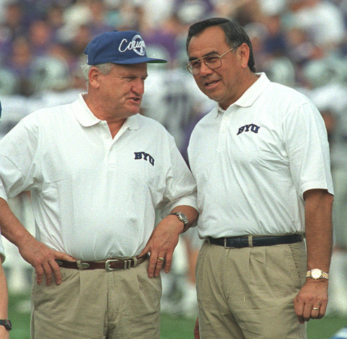 Tribune file photo
Norm Chow chats with Lavelle Edwards in this photo shot before the Cotton Bowl in 1997. Chow, a Hawaii native, was BYU's primary recruiter of players in the islands in the 1980s and '90s.