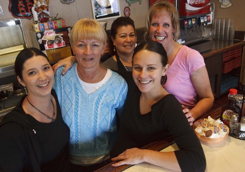 Leah Hogsten  |  The Salt Lake Tribune
Sharon's Cafe owner Sharon Ahern (in blue) joined by her waitressing staff, Aubry Rushton, Teresa Chavez, Andrea Fowkes and her daughter Shannon Prescott at her side. Sharon's Cafe, a popular Holladay diner with plenty of personality, celebrates 10-years of treating regulars and newcomers alike with down home hospitality and warmth.