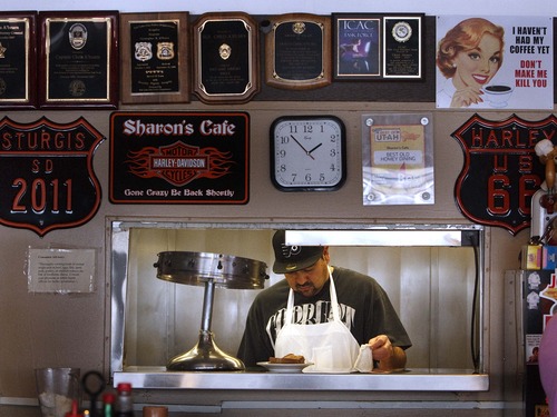 Leah Hogsten  |  The Salt Lake Tribune
Sharon's Cafe chef Javier Montanez makes sure orders are correct behind the counter.