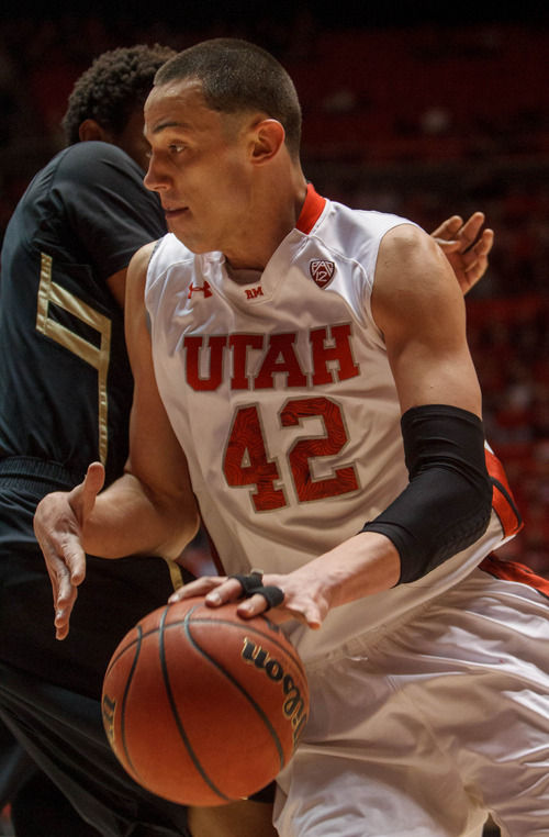 Trent Nelson  |  The Salt Lake Tribune
Utah's Jason Washburn with the ball as Utah hosts Colorado, college basketball Saturday, February 2, 2013 in Salt Lake City.