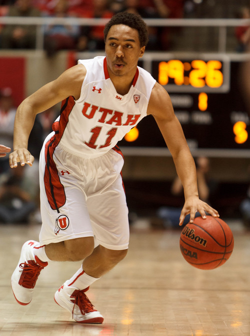 Trent Nelson  |  The Salt Lake Tribune
Utah's Brandon Taylor dribbles the ball as Utah hosts Colorado, college basketball Saturday, February 2, 2013 in Salt Lake City.