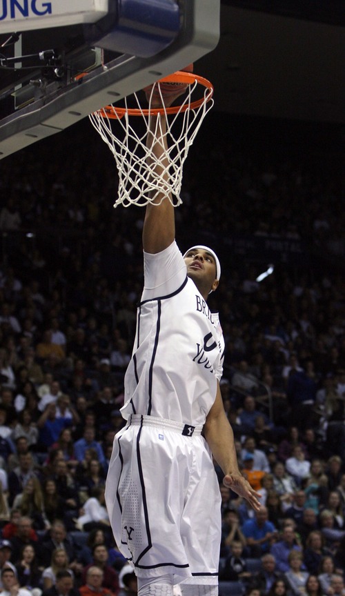 Kim Raff  |  The Salt Lake Tribune
Brigham Young Cougars forward Brandon Davies (0) dunks the ball against Santa Clara Broncos during a game at the Marriott Center in Provo on February 2, 2013.