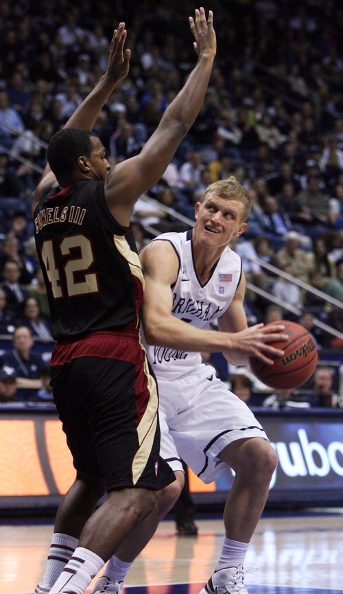 Kim Raff  |  The Salt Lake Tribune
(right) Brigham Young Cougars guard Tyler Haws (3) looks for a shot as Santa Clara Broncos guard Raymond Cowels III (42) defends during a game at the Marriott Center in Provo on February 2, 2013.