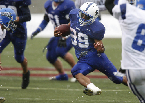 Rick Egan | The Salt Lake Tribune

Douglas Fiefia runs the ball for the Bingham Miners in playoff action on Nov. 9, 2005, at  Rice-Eccles Stadium. Fiefia is one of many Polynesian athletes with Utah ties who have helped elevate football in the state.