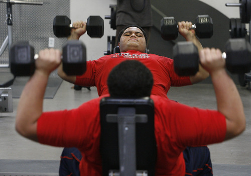 Scott Sommerdorf   |  The Salt Lake Tribune
Merrill Taliauli lifts weights at the Northwest Multipurpose Center, Friday, Jan. 25, 2013.